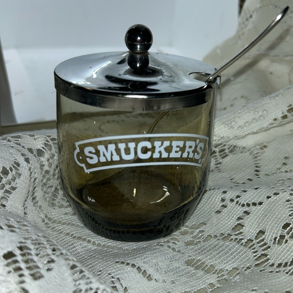 Smucker’s jelly jar with spoon. - Picture 1 of 3